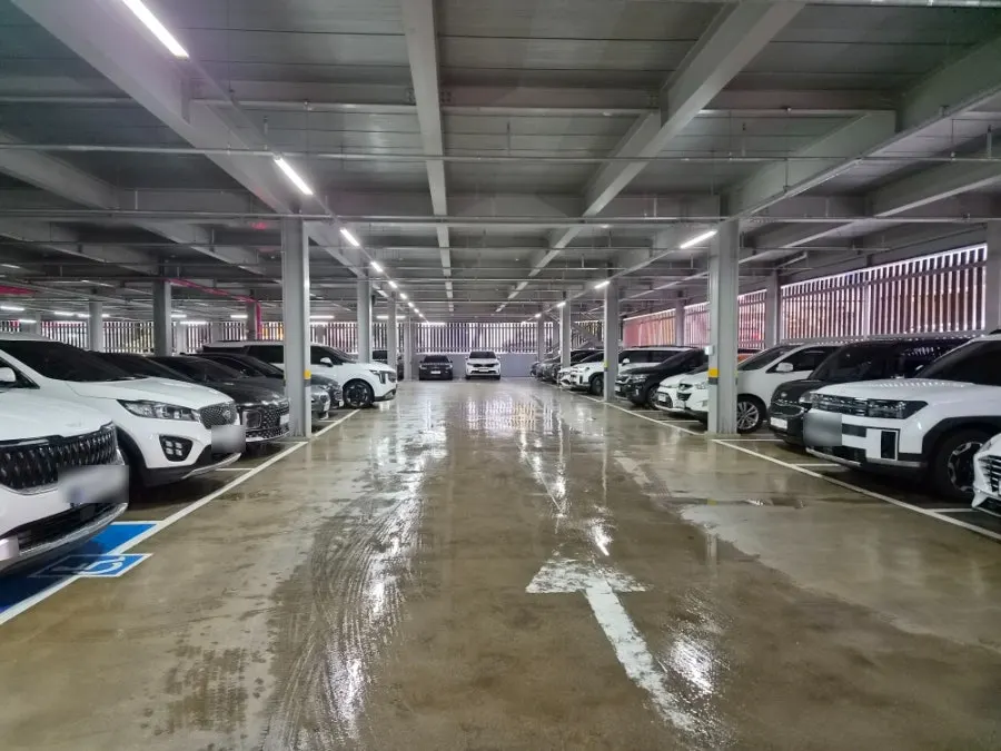 View of the nearby Deoksimgong building parking lot