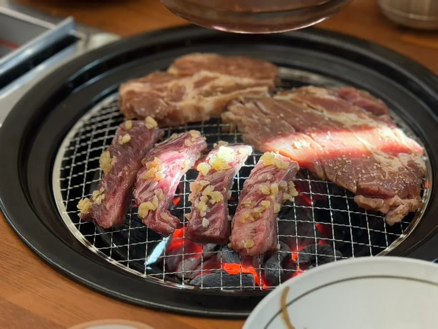Family meal at Ihwajeong Charcoal-Grilled Pork Galbi in Pyeongtaek