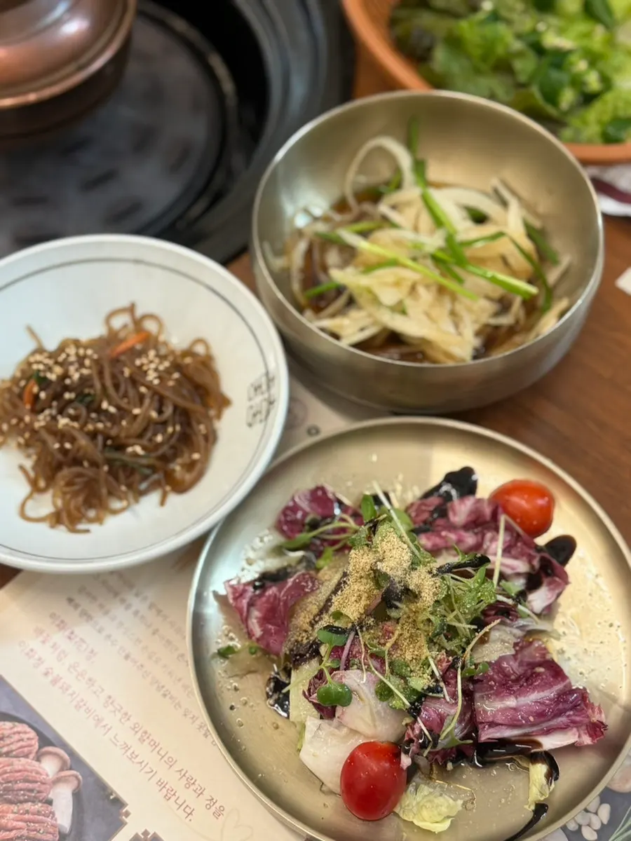 Banchan table setting at Ihwajeong Charcoal-Grilled Pork Galbi