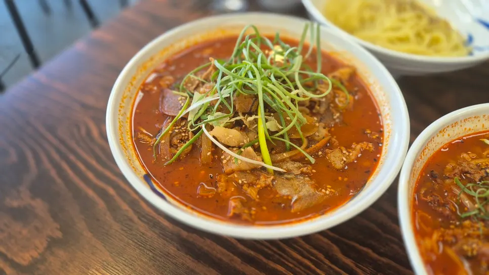 Meat jjambbong topped generously with pork