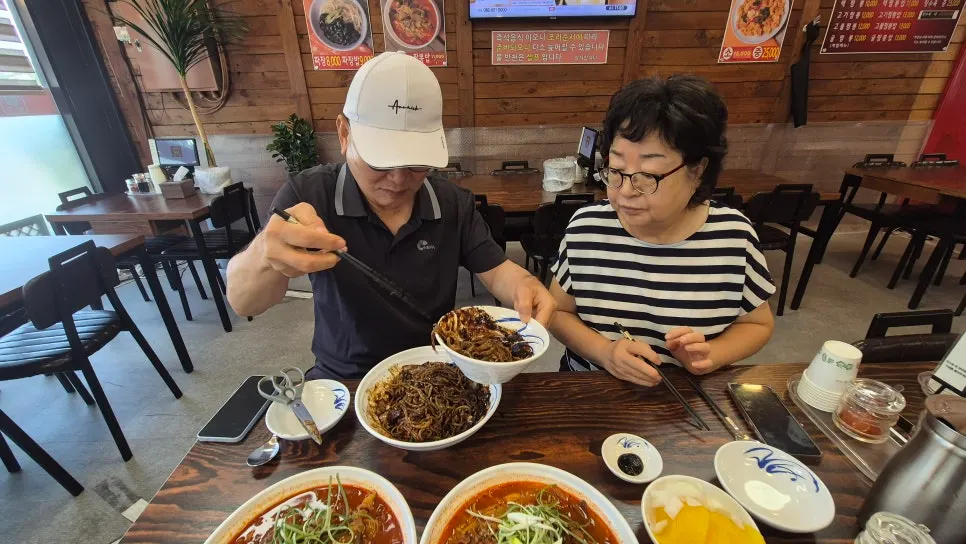 Family sharing Chinese dishes
