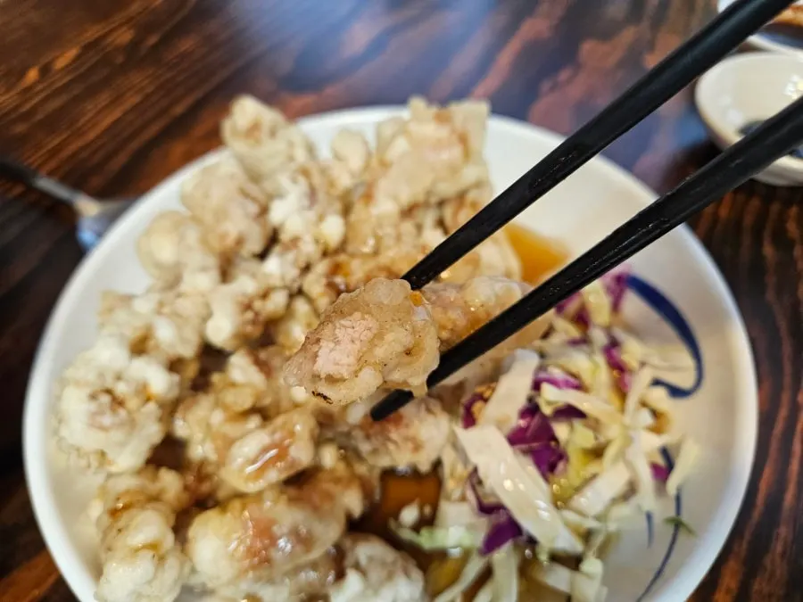 A plate of tangsuyuk served with sauce
