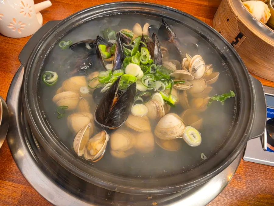 Mulchong kalguksu with dongjuk clams and mussels