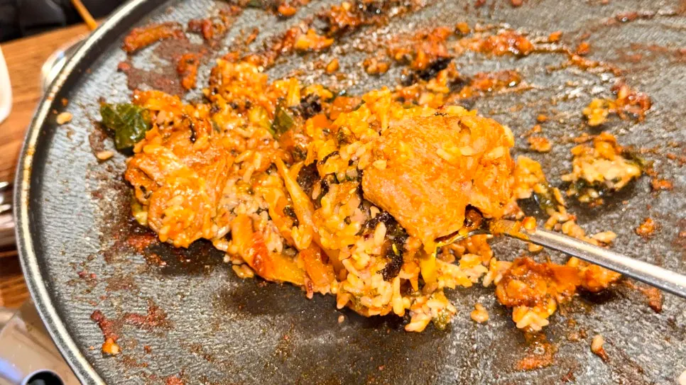 Making fried rice with the remaining sauce