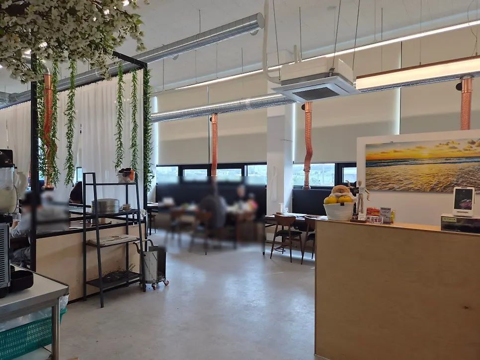 Dining room with generous spacing between tables