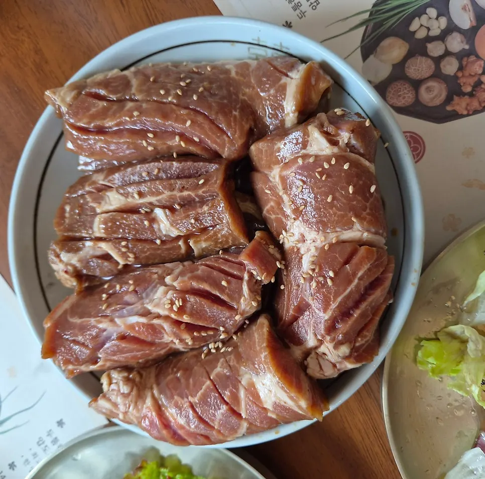 Raw pork galbi aged in a pear-based marinade