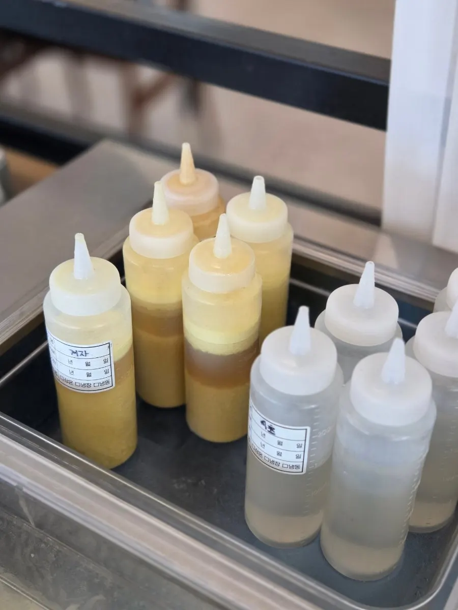 Vinegar and mustard for cold noodles at the self-service corner