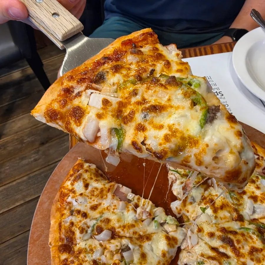 Combination pizza with cheese and toppings