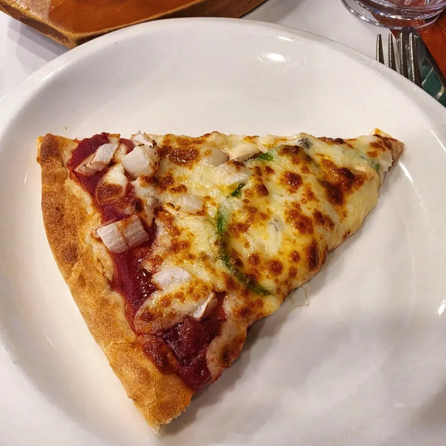 Combination pizza with stretchy cheese