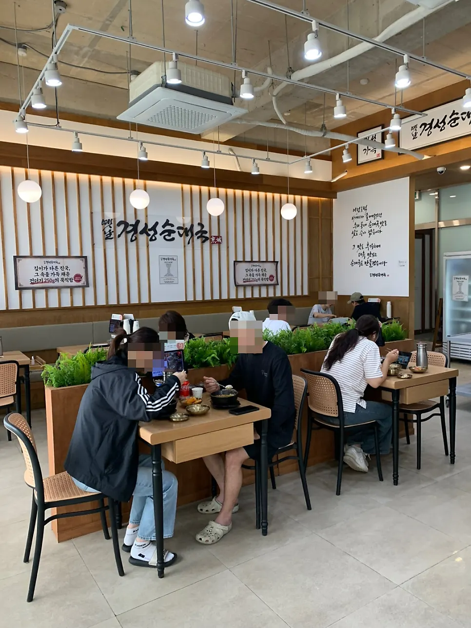 Spacious interior with multiple tables