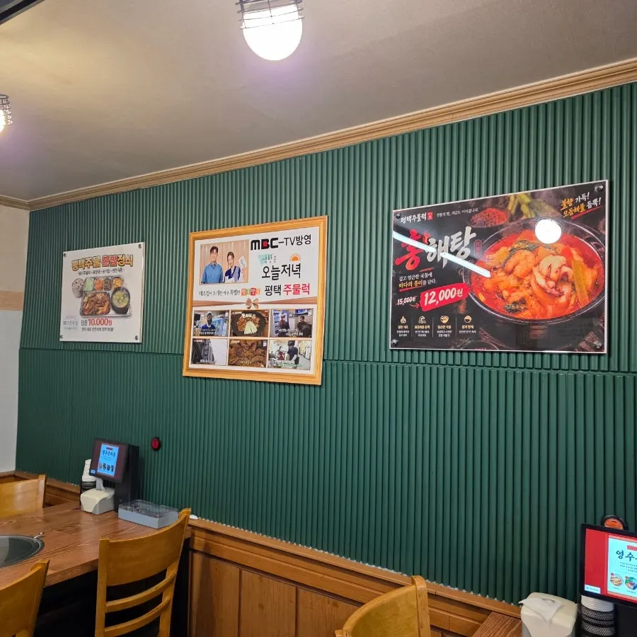 Century-Old Store certification and award frames on the wall