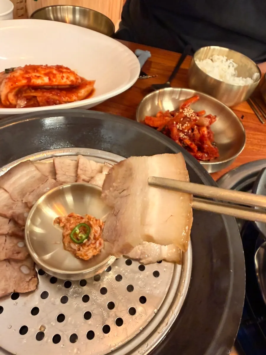 Pot of mulchong kalguksu starting to boil