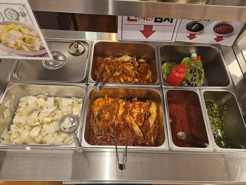 Aged and fresh kimchi at the self-serve bar