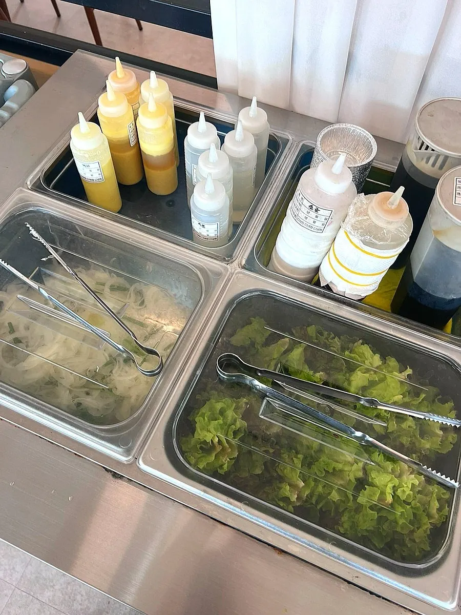 Self-serve bar stocked with lettuce and ssamjang