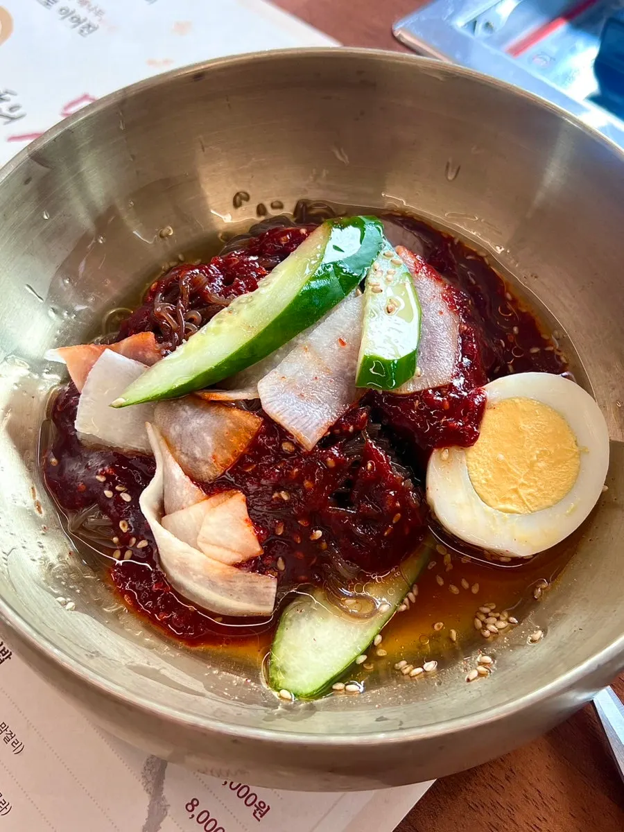 Pork galbi picking up smoky aroma over charcoal