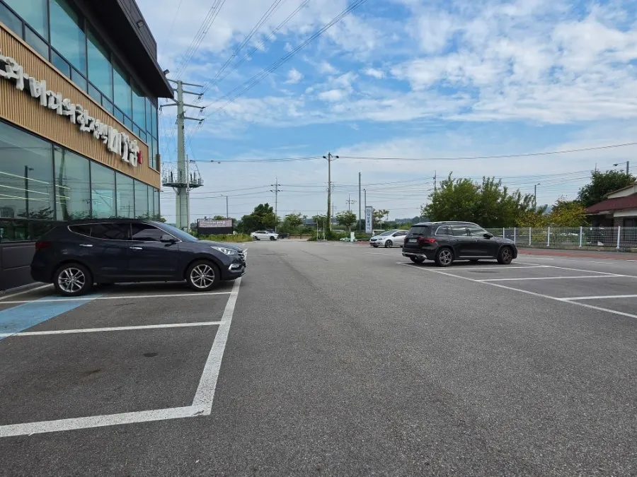 Wide parking space around the building