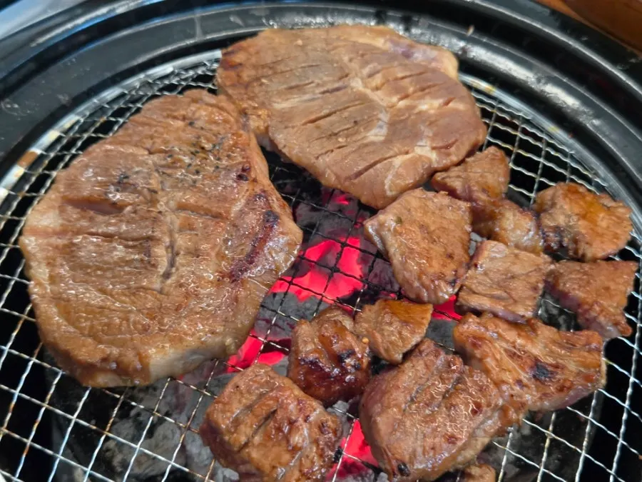 A plate of seasoned pork grill aged in pear marinade