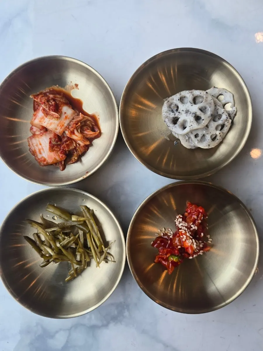 Menu showing seafood nurungji-tang and wild ginseng cultured root nurungji-tang