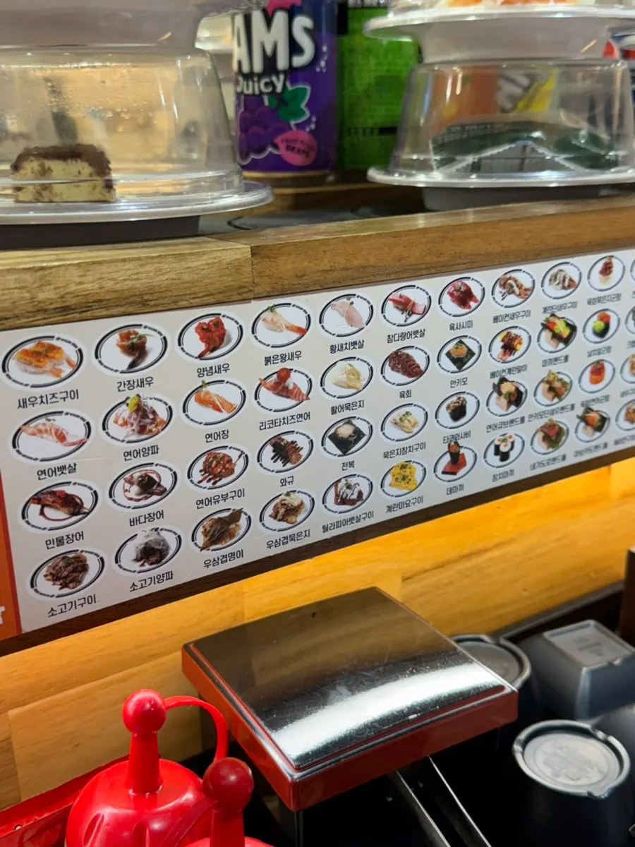 A plate with seared sushi and gunkan sushi