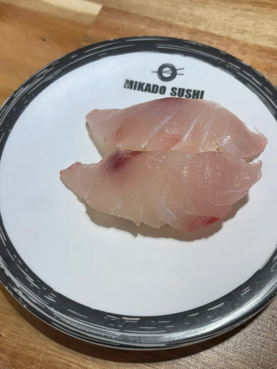 A variety of conveyor-belt sushi selections