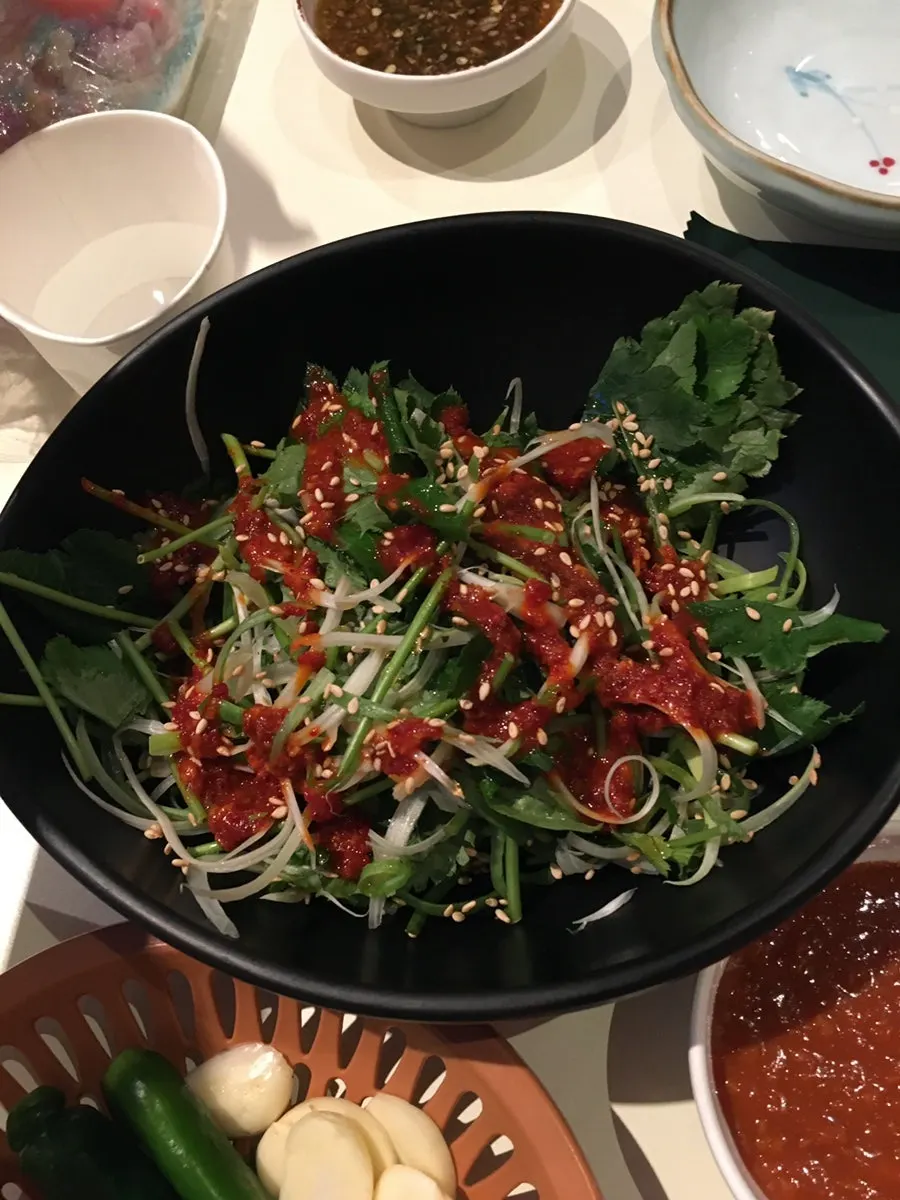 Plates of pepper strip jangajji and minari-muchim
