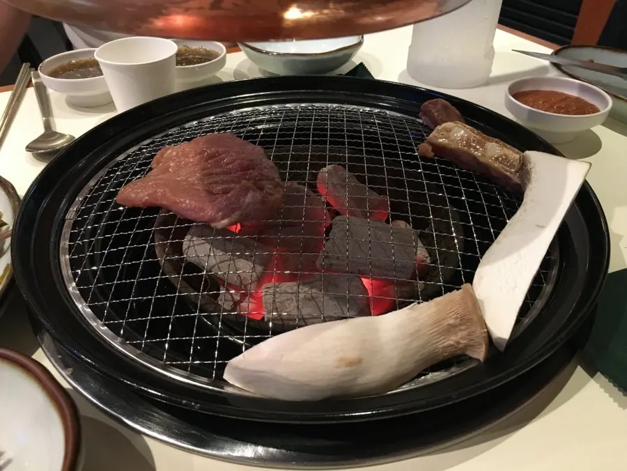 Yuzu-aged pork galbi placed on the grill