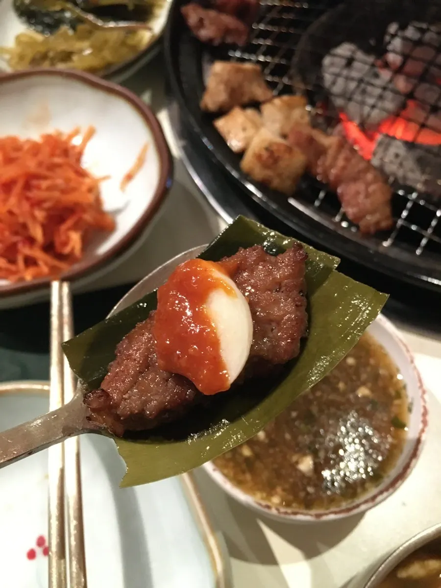 Meat and garlic wrapped in myeongi-namul