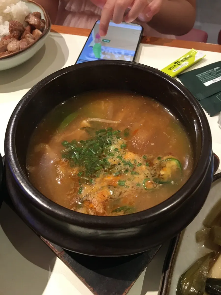 A bowl of Okryeon Galbi's house doenjang stew