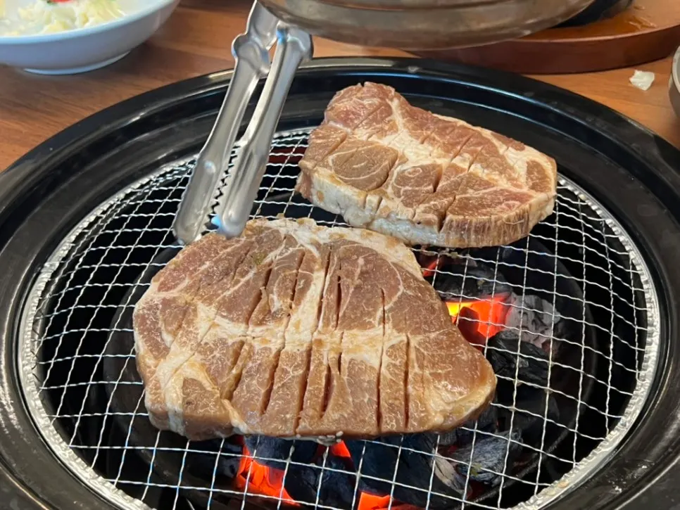 Marinated pork galbi grilling over charcoal