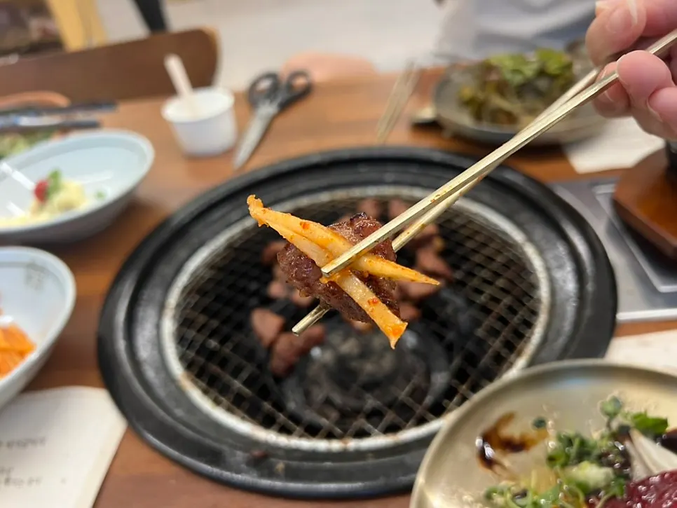 Marinated galbi at the final stage of grilling on the pan