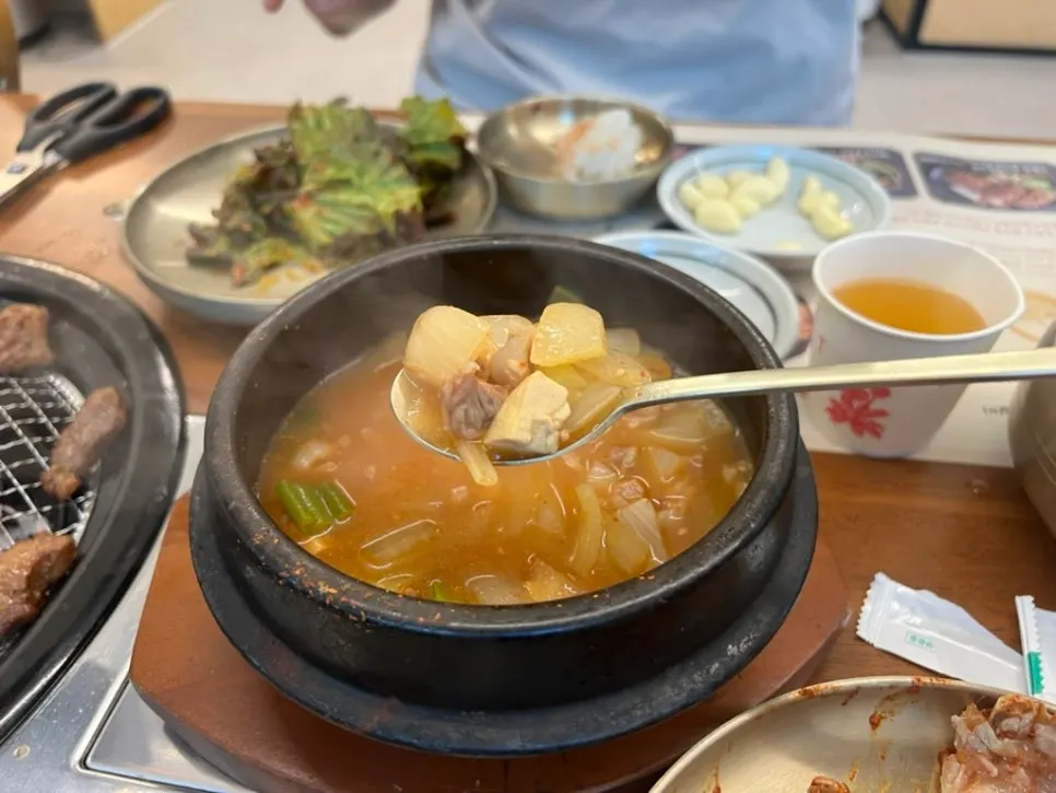 Table set with doenjang stew and rice to finish the meal