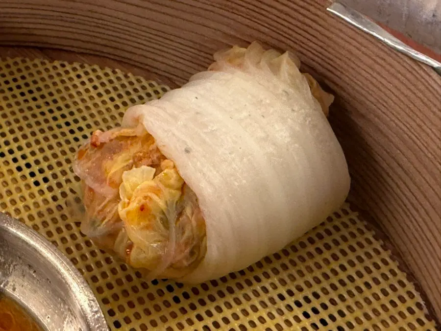 Dumpling cut in half showing the filling