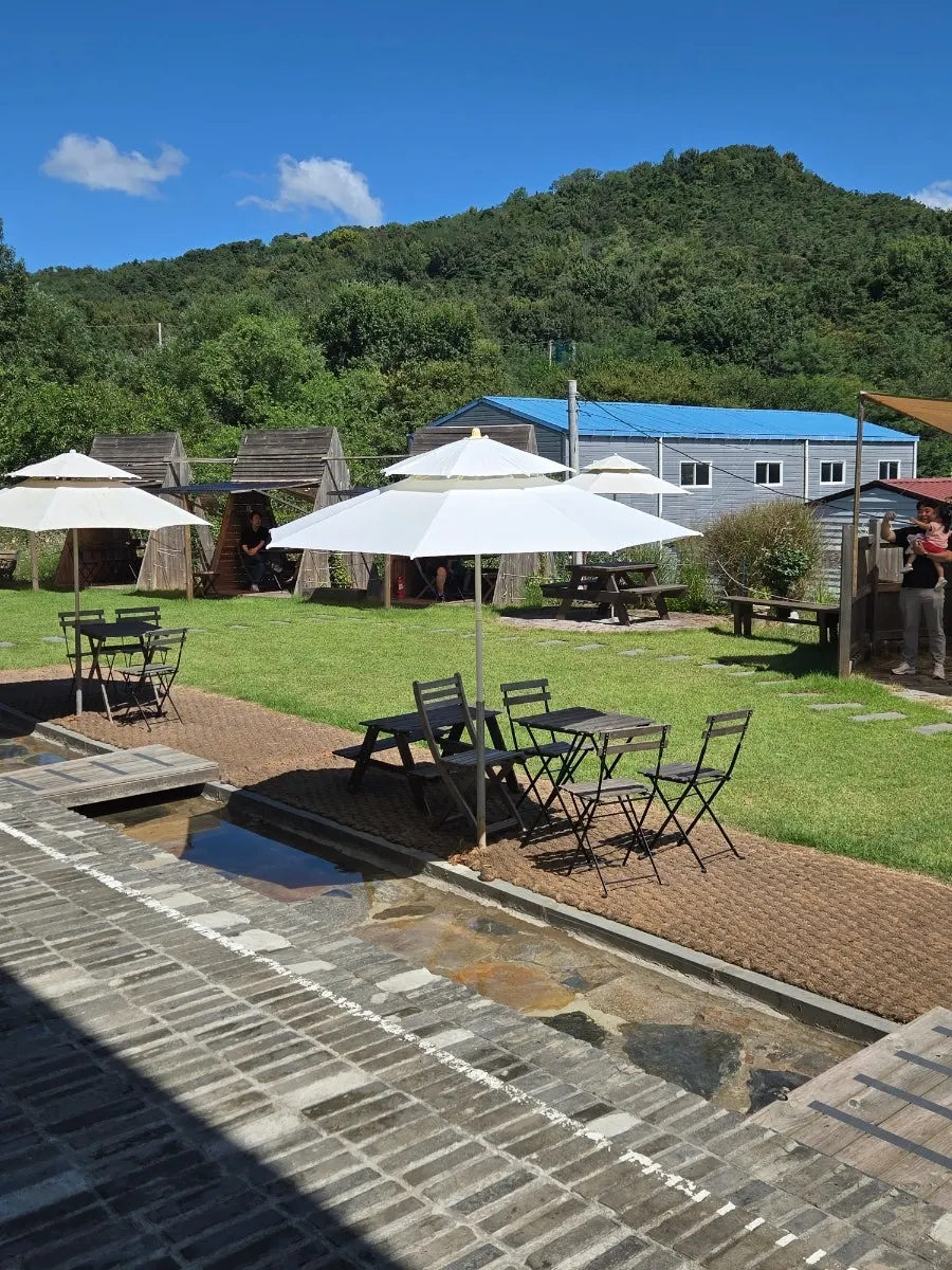 Shaded terrace seating at Sisup
