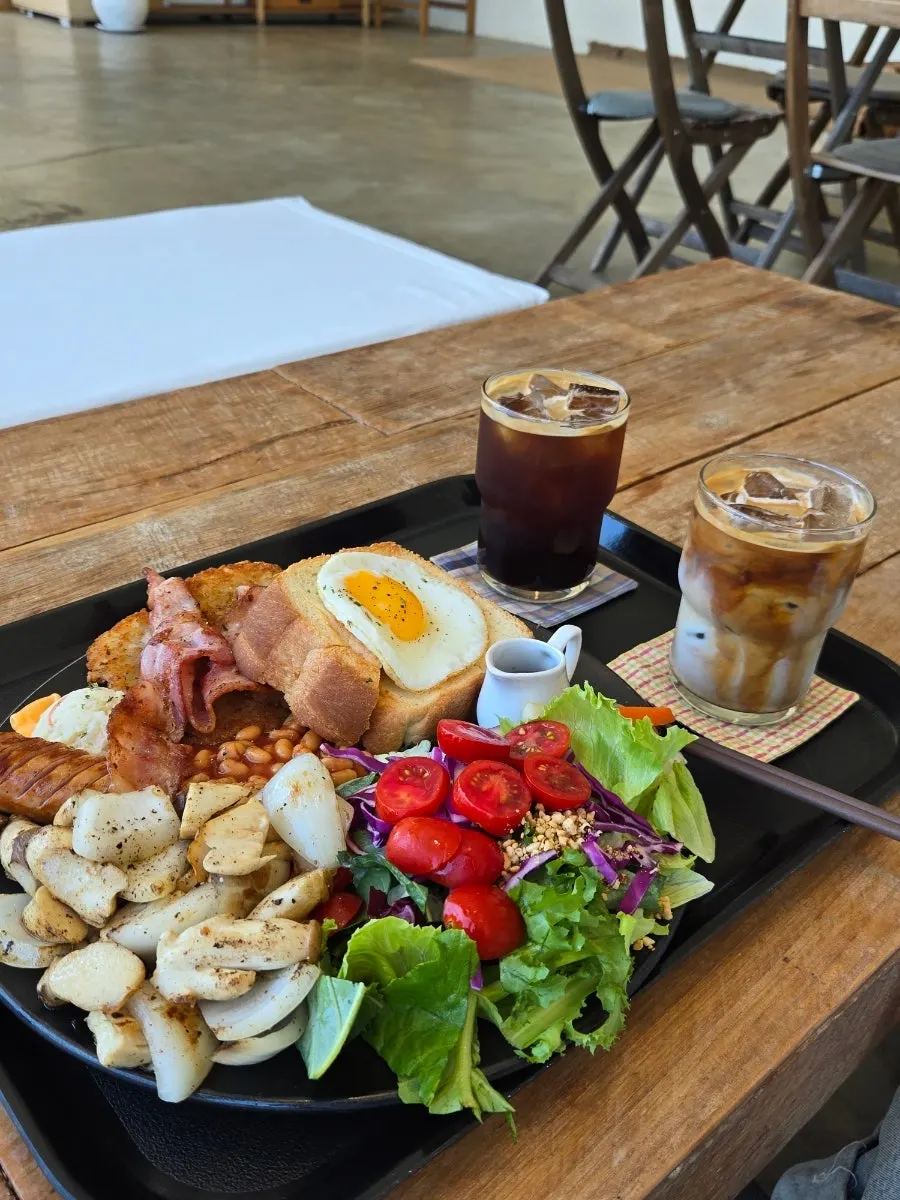 Fresh salad and sautéed mushrooms on the brunch plate