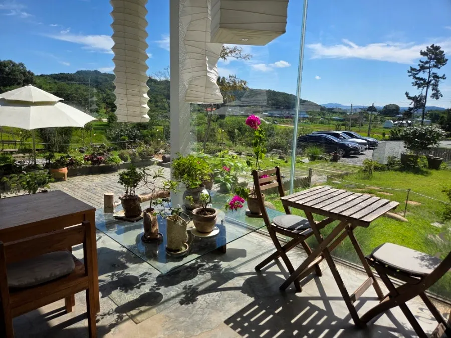 Sisup café building and surrounding scenery in Sinwang-ri