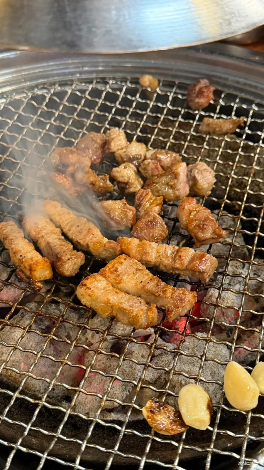 Thick pork belly on the charcoal grill
