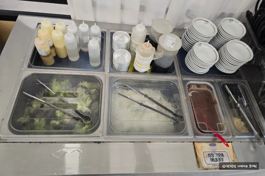 Self-bar where guests can grab banchan and wrap vegetables