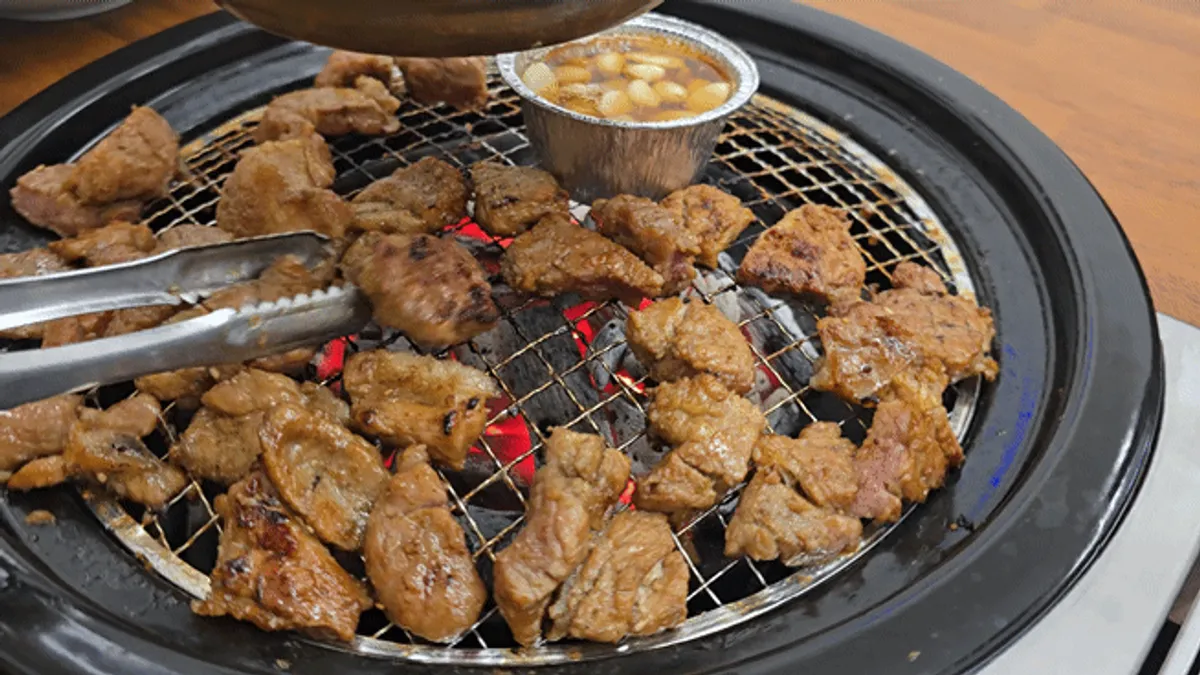 A nicely browned piece of seasoned pork galbi