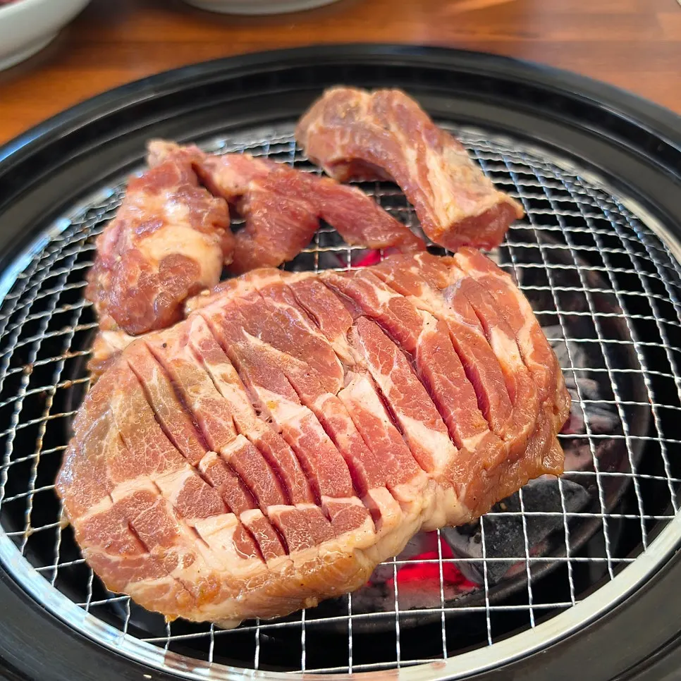 Plate of thick pork neck seasoned pork grill