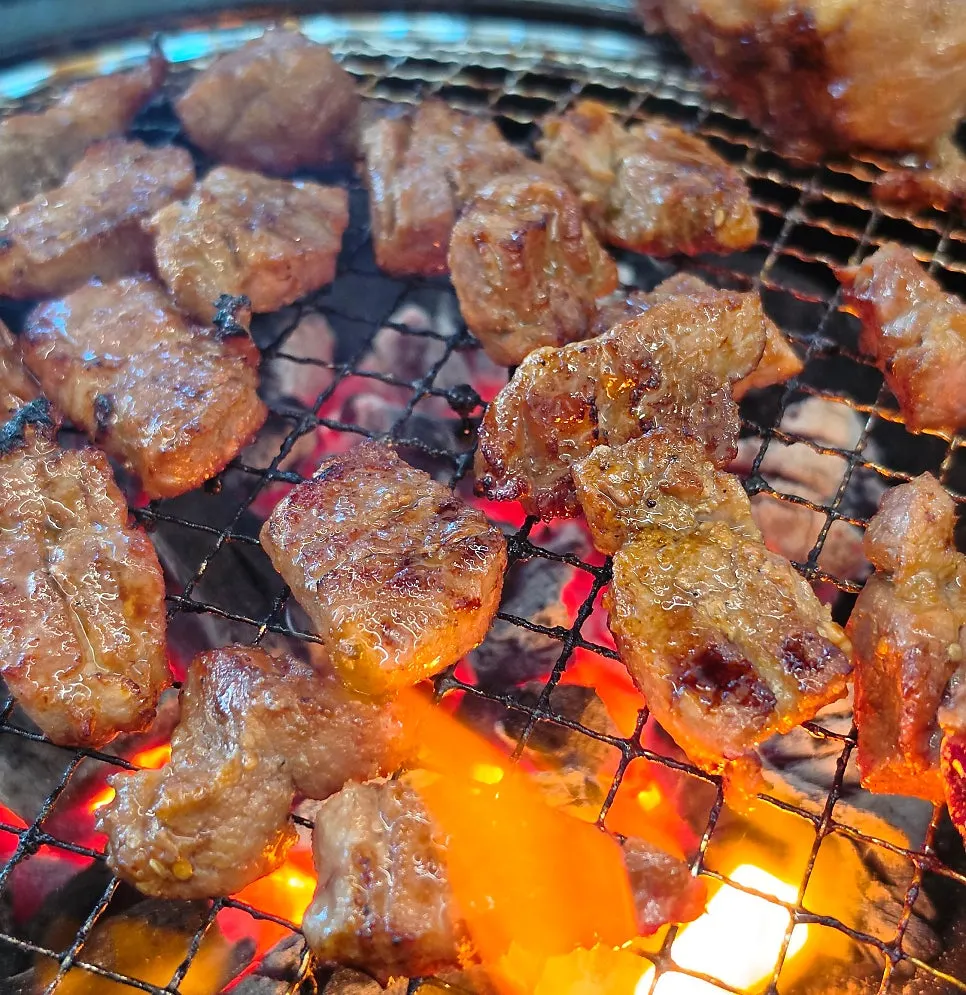 Seasoned galbi cut into bite-sized pieces and grilled again
