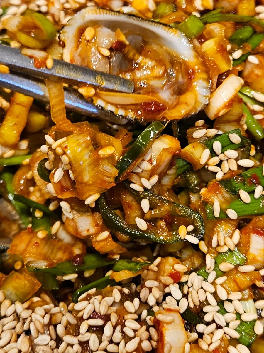 Close-up of plump seasoned cockles