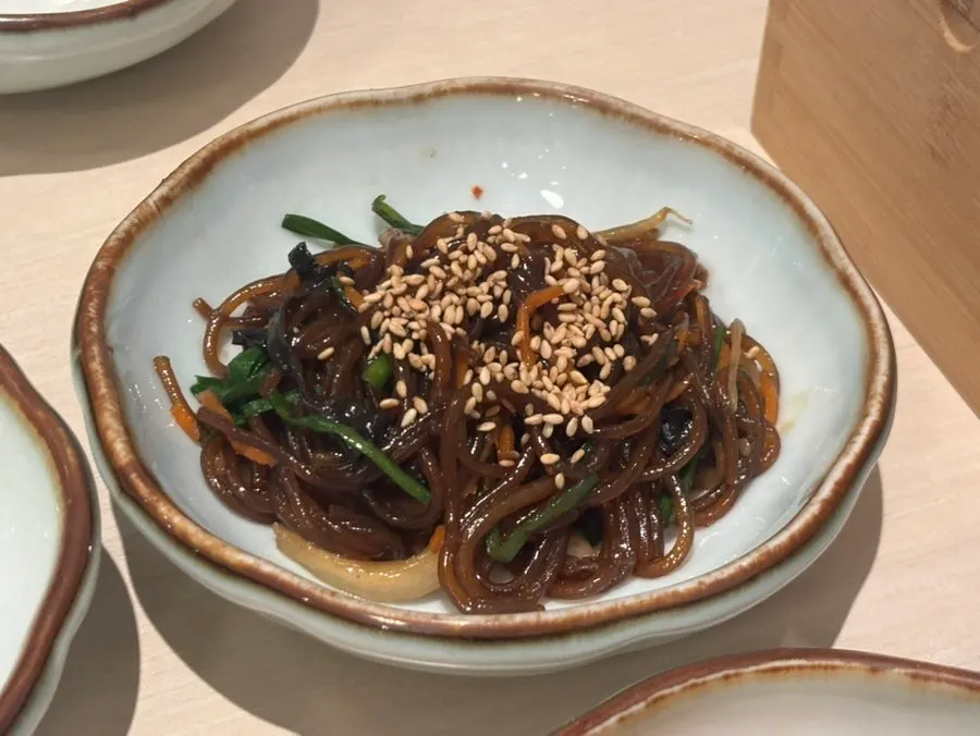Full side dish setting at Okryeon Galbi