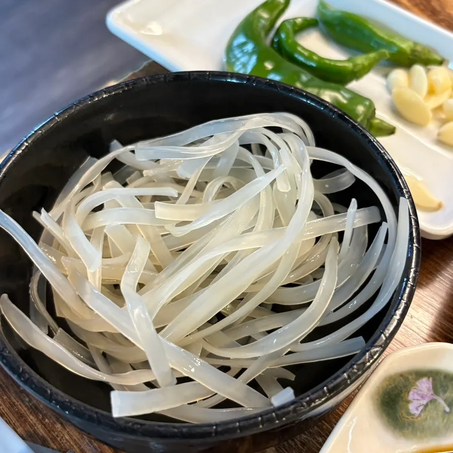 Gochujang jumulleok cooking on the griddle