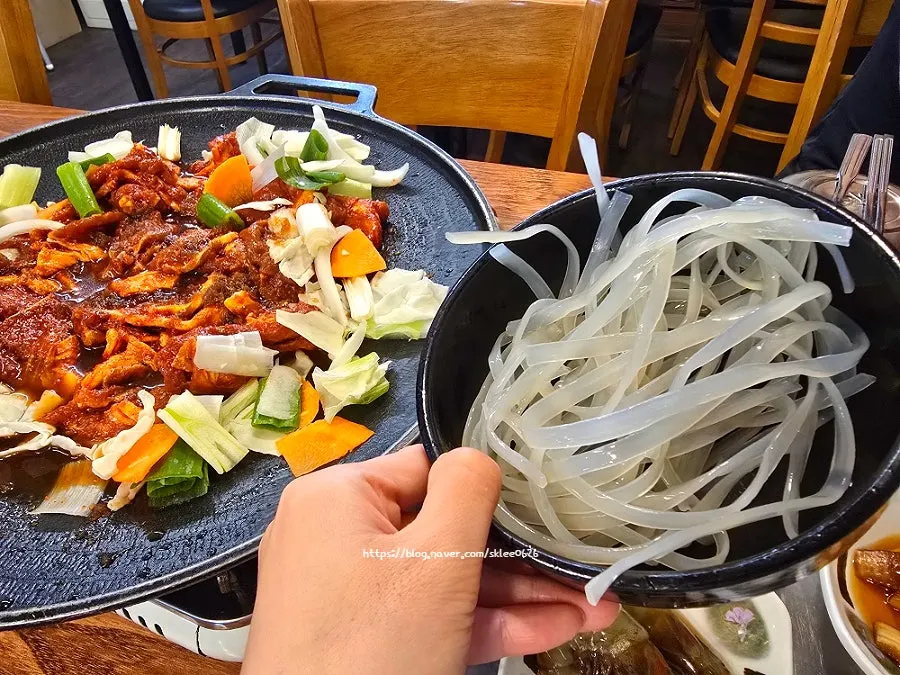 Free flat glass noodles added to the gochujang jumulleok