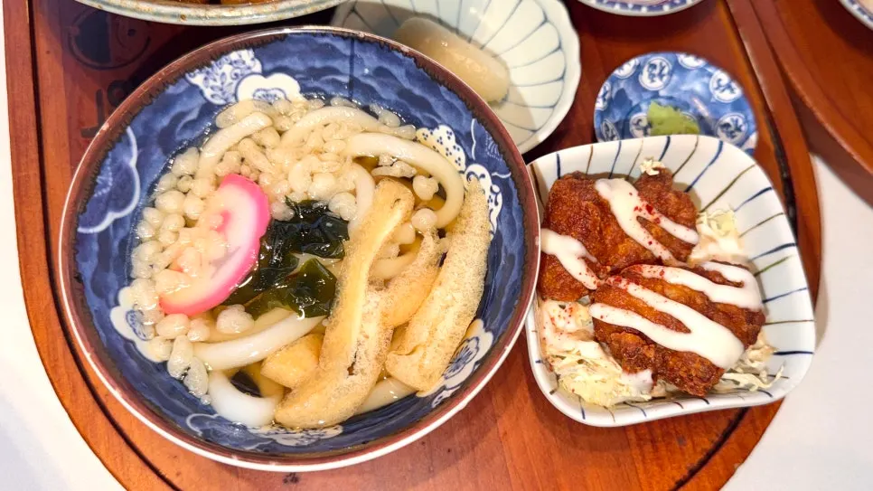The tonkatsu curry rice bowl with its side dishes