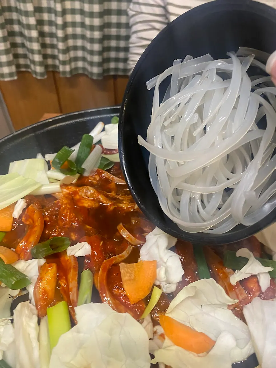 Well-cooked jumulleok placed over rice