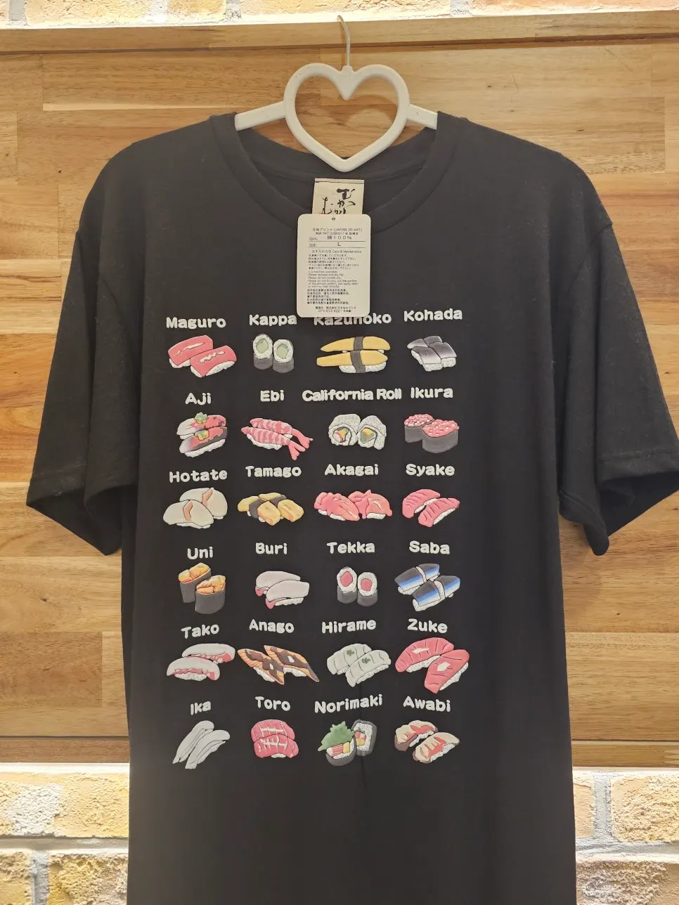 Merch t-shirt covered in sushi prints