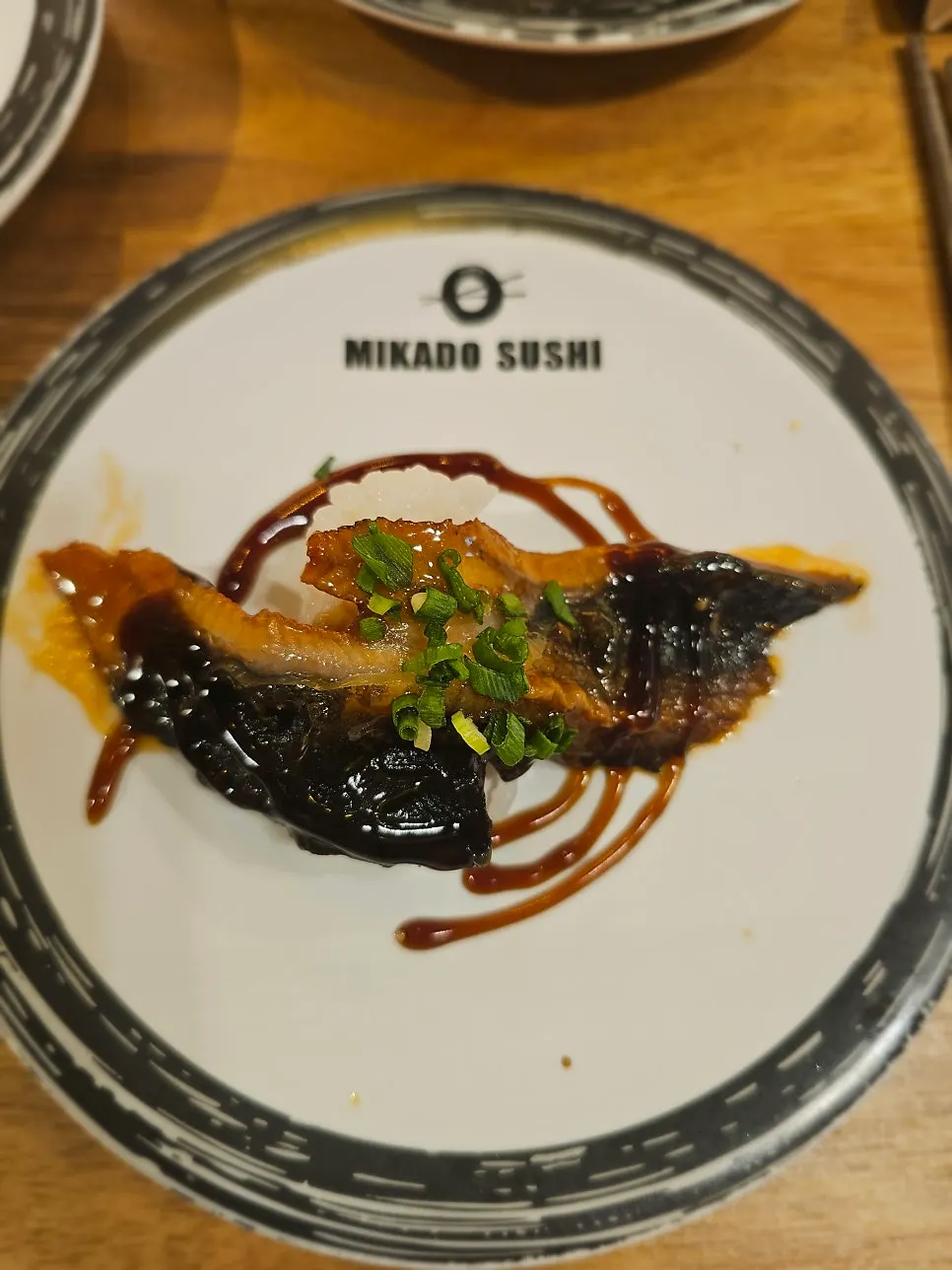 Salmon belly, swordfish belly, and other raw fish sushi