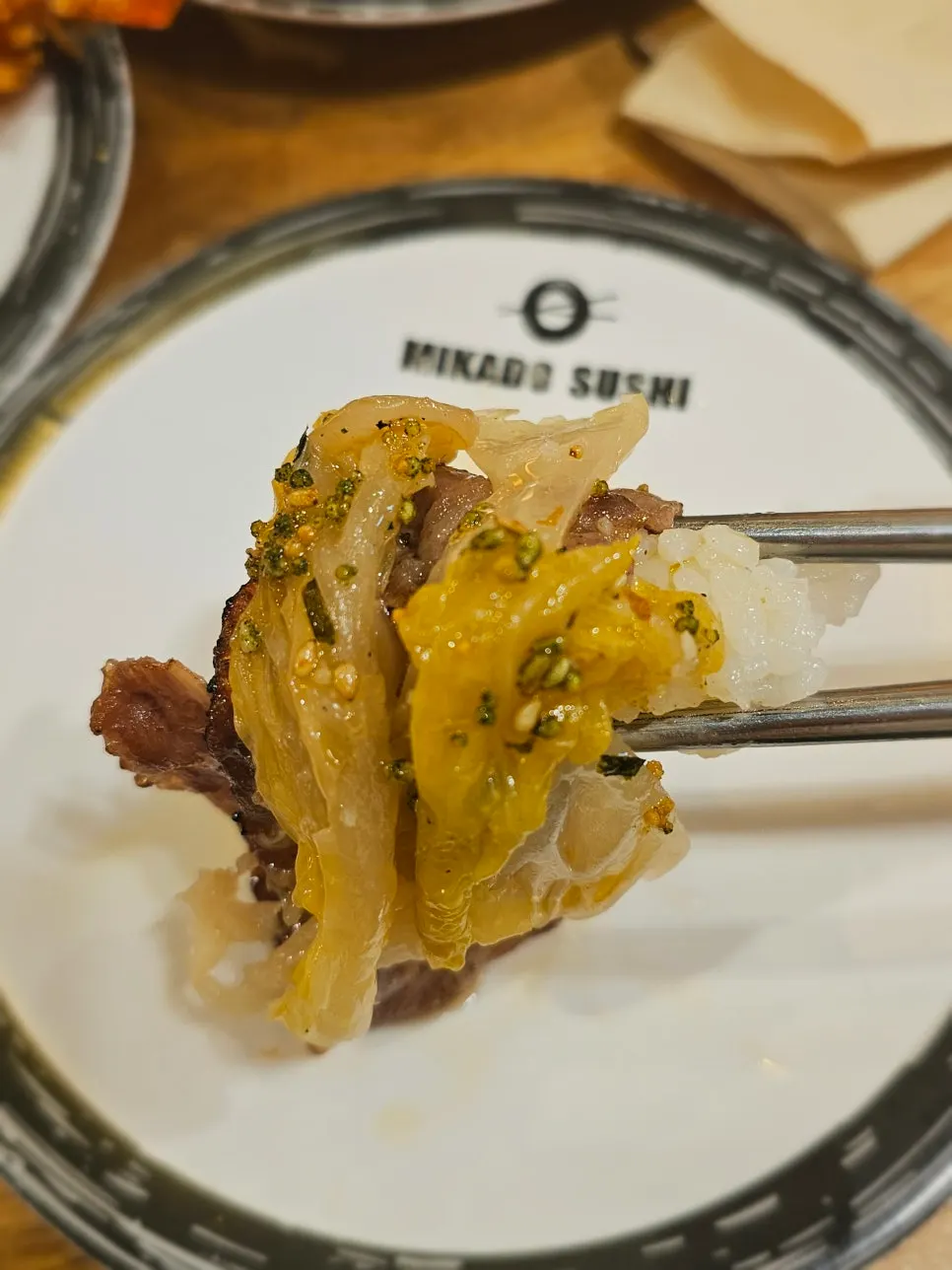 Aged kimchi beef sushi piled high with kimchi