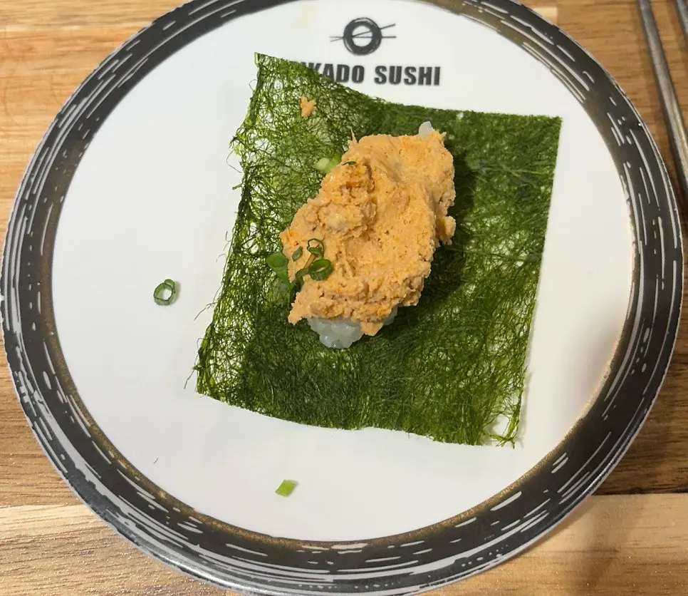Close-up of raw fish sushi on a plate